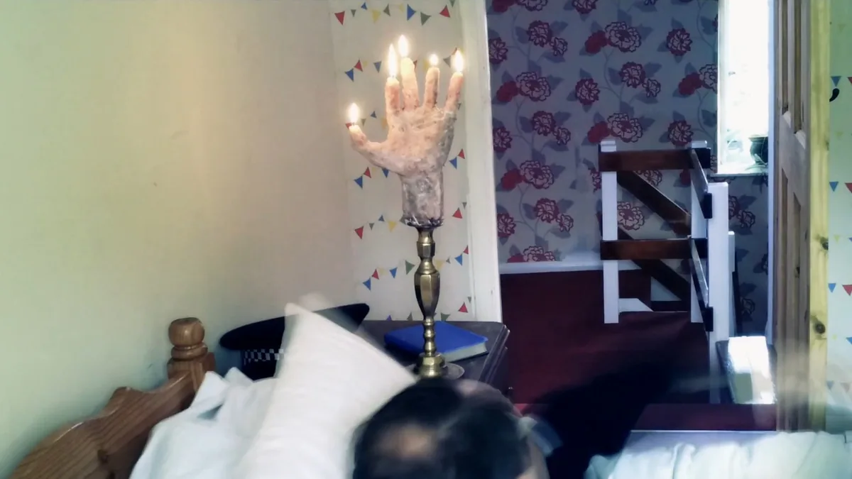 A frame from Questions